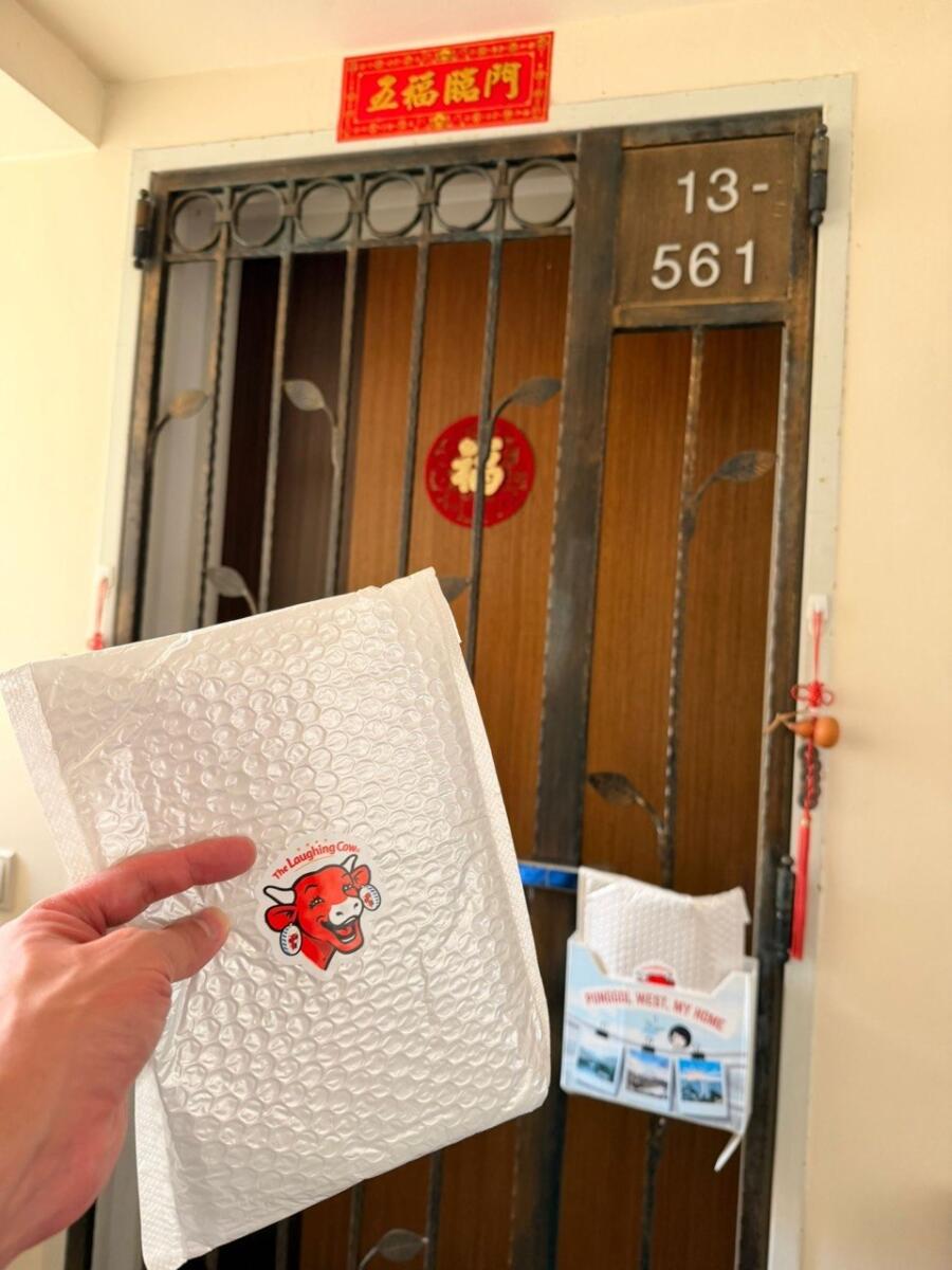 HappiMail poly mailer delivered to a resident doorstep